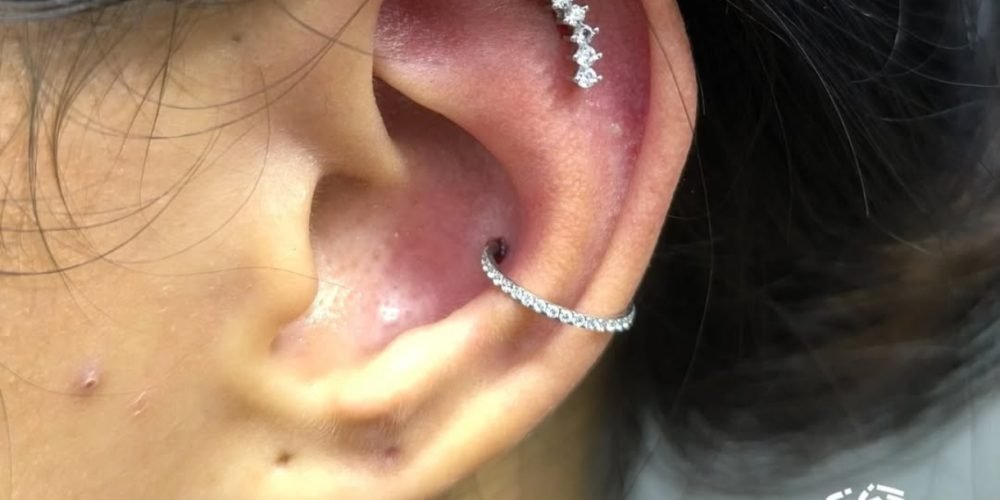 PIERCING ORELHA EM SANTA ISABEL - KINGS TATTOO